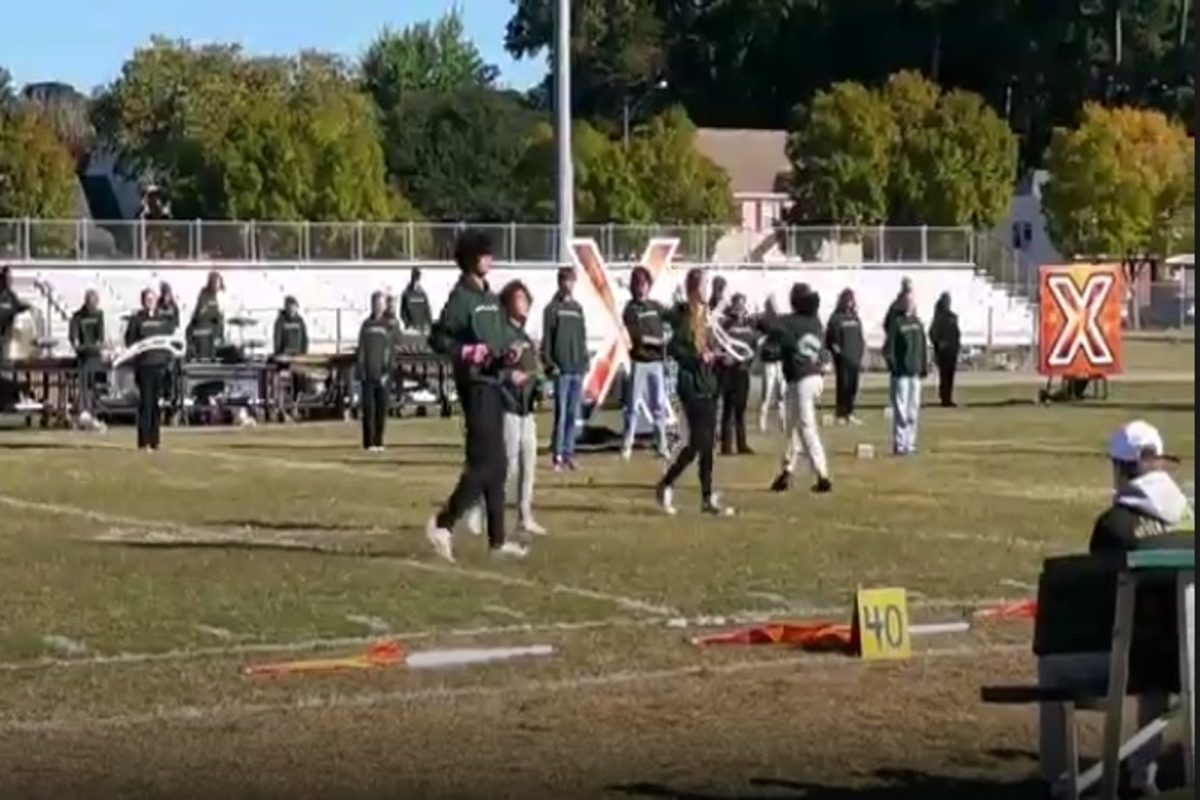 MARCHING FALCONS BAND members performed at both the pep rally and during Homecoming halftime on Friday.  The band was led by senior Emily Cotter as musical conductor.