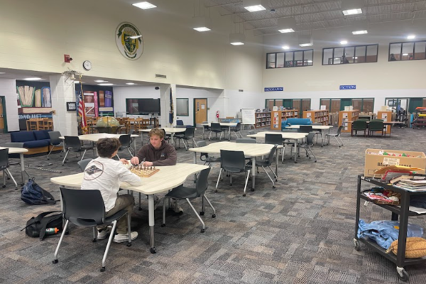 STUDENTS SEEMINGLY LOVE the "Nest's" newest additions to the library. New furniture, new games, and an exercise station add to the "vibe".