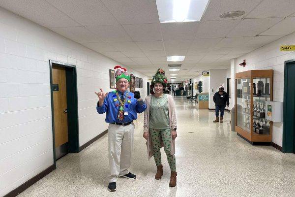 ENGLISH TEACHER MR. Graninger participates in the winter spirit week with his crazy hat and holiday lights. Graninger encouraged students to take part in the wacky week. 