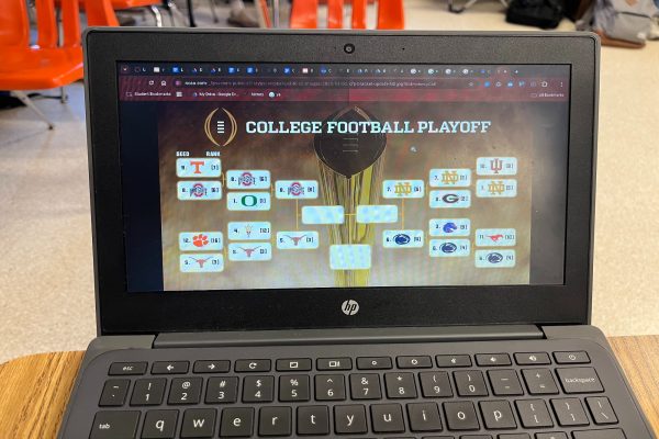 STUDENTS RESEARCH THE upcoming College Football Playoff bracket to determine what teams to choose. Playoff semi-finals begin this week. 