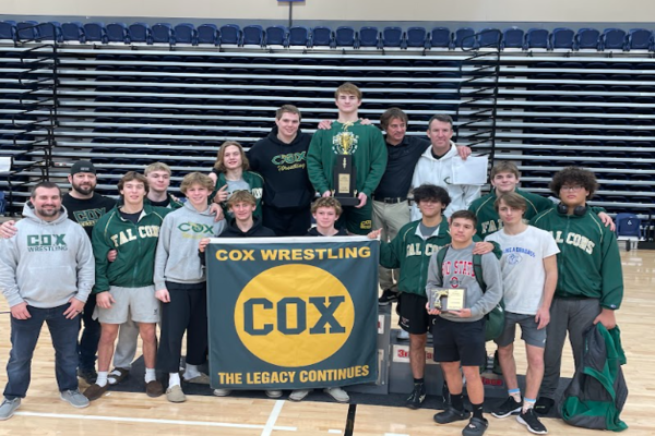 CHS WRESTLERS CELEBRATE one of their most recent wins recently at the Richmond Invitational. The Falcons dominated other wrestling programs, scoring the most points at the tournament. 