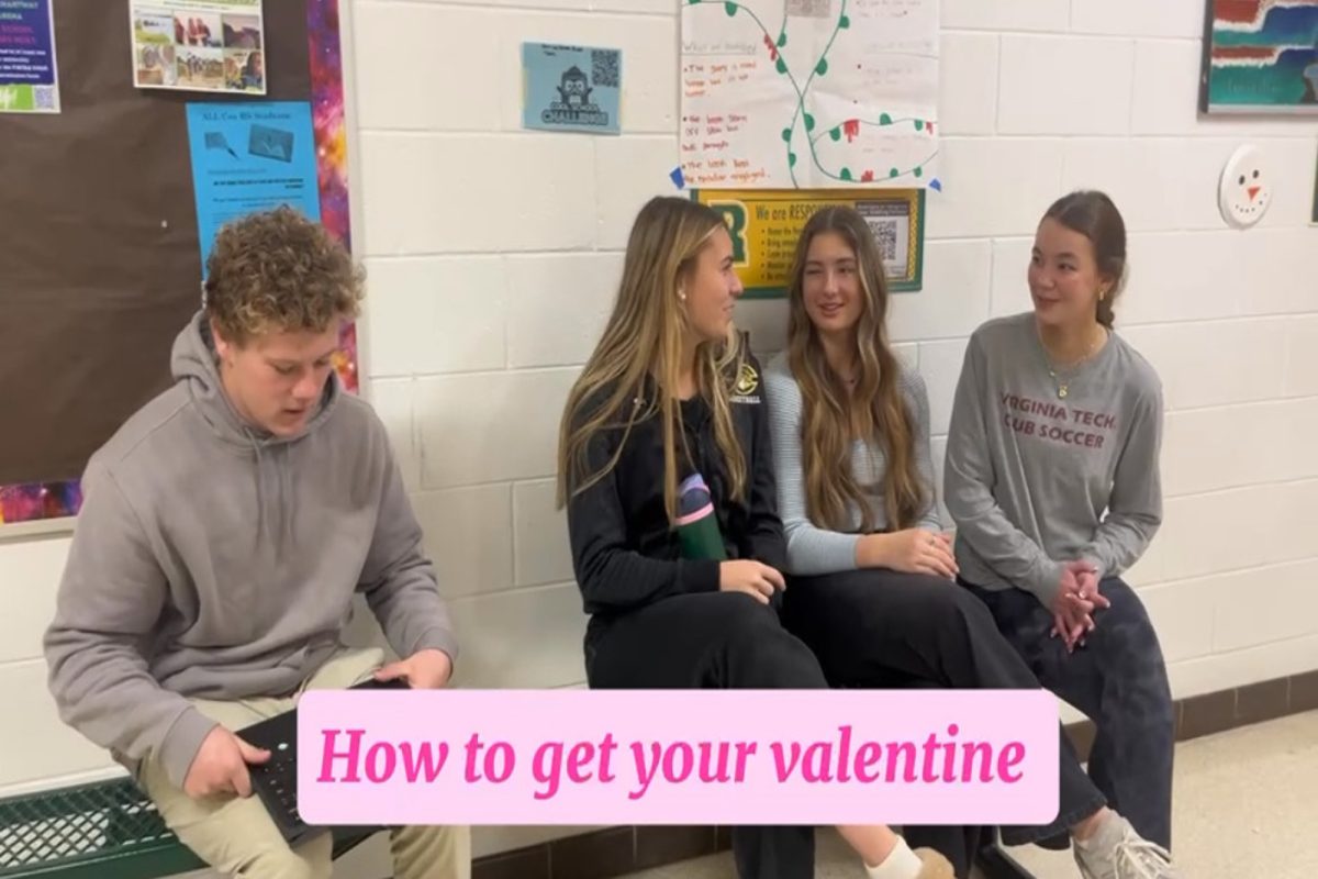 SENIORS CHRISTIAN BRAITHWAITE and Erma Bailey discuss their plans for Valentine's Day. In the end, Braithwaite helped senior Blake Heselius find his Valentine. 