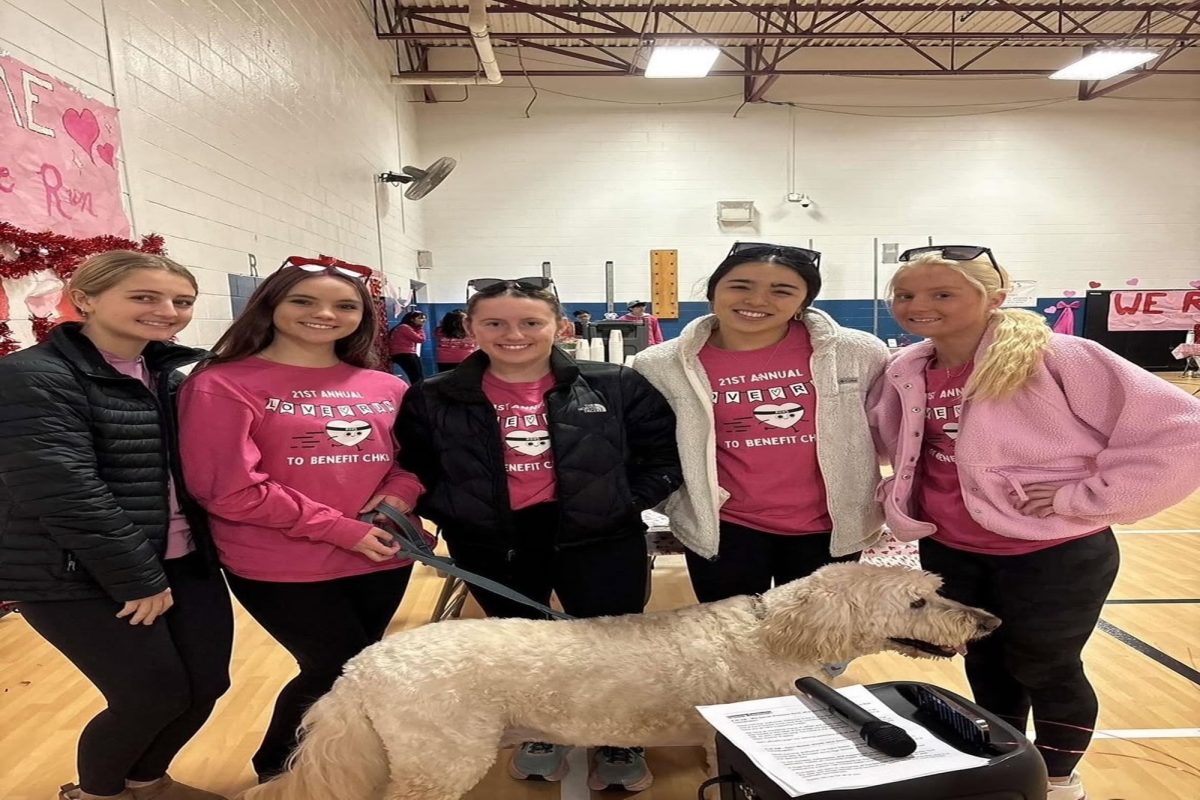 CHKD LOVE RUN/Walk for a Cure volunteers decked themselves out in shades of pink and red to show their support. Overall, the annual event was successful and brought out community members, students from various Virginia Beach schools and even pets.