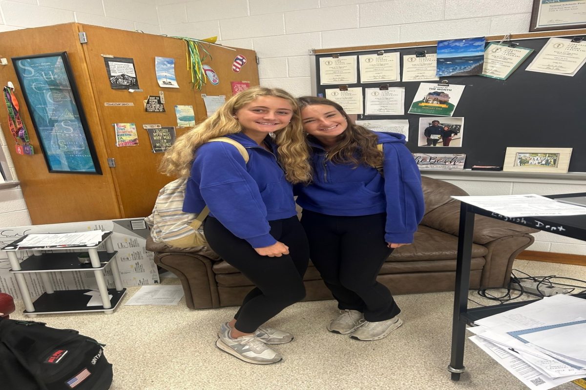 JUNIORS SAMI SAGER (left) and Addie Rekant showed off their 'fits' for Twin Day, one of the spirit days during Love Run Spirit week. Sager and Rekant often dress similarly anyway, making the dress up day easy.