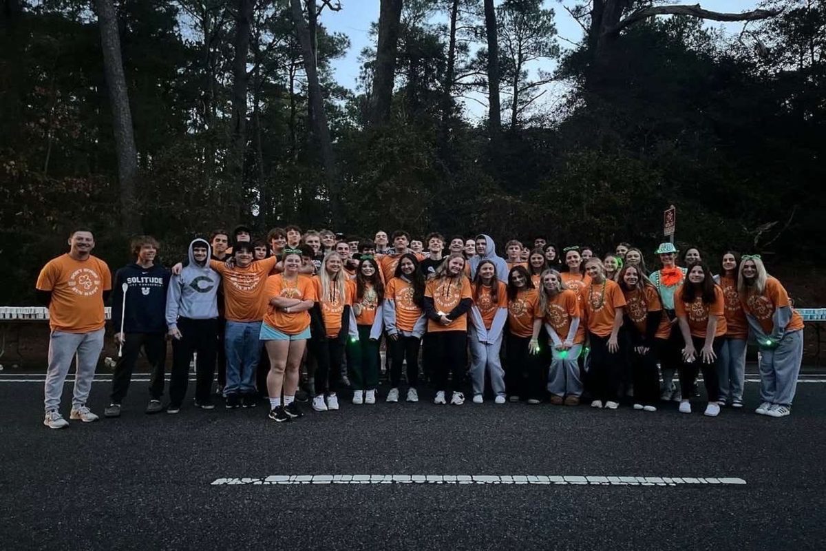 GIRLS AND BOYS LACROSSE volunteered  last weekend to work shifts during the 54th Annual Shamrock Marathon in honor of St. Patrick's Day. Players provided water and cheered on the runners as they competed for first place. 