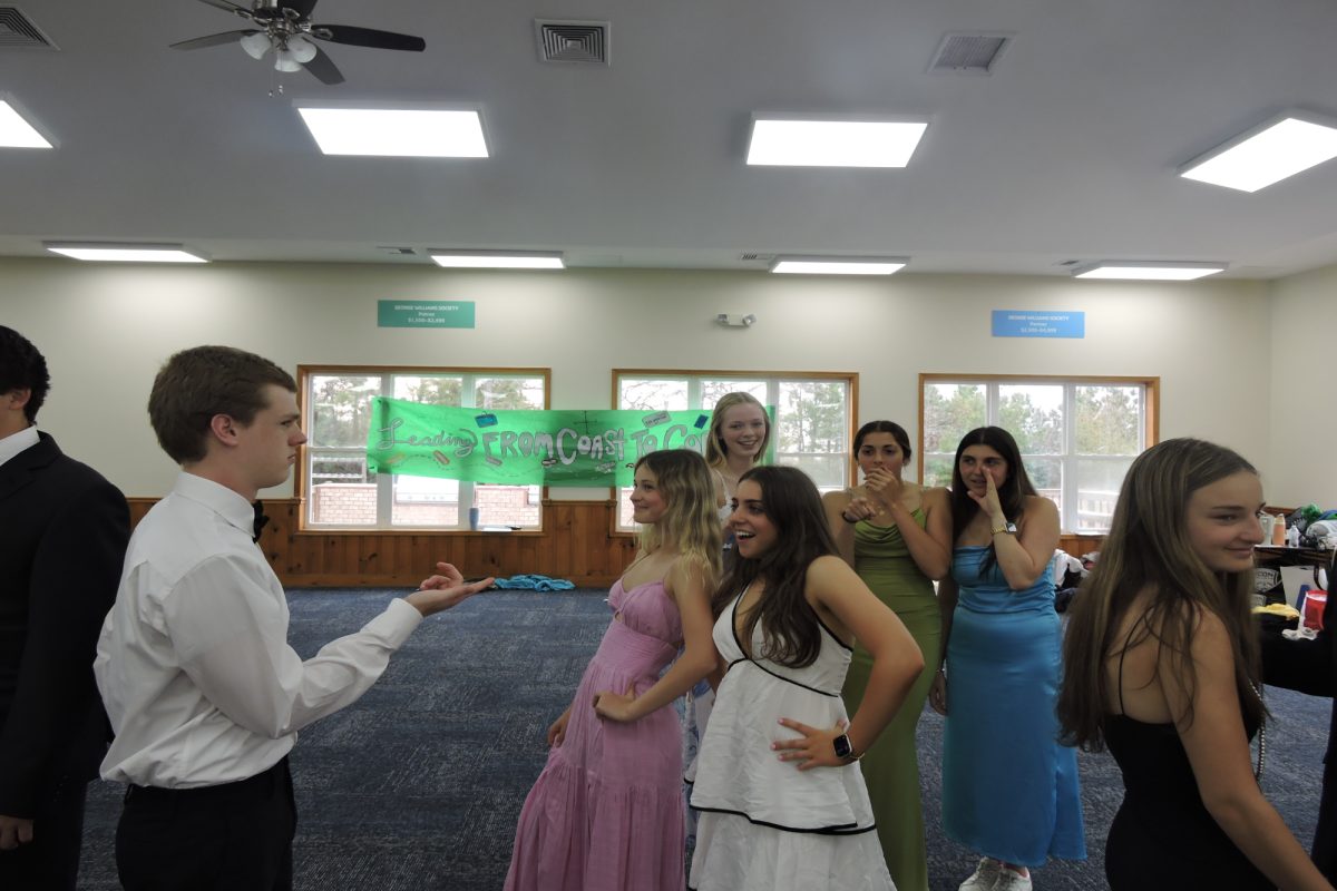 SENIOR ALEX GEN prepares her group to perform a mini skit to delegates at Leadership Workshop. The underclassmen learned the qualities of a good leader.