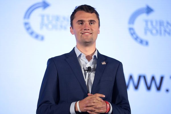 CHARLIE KIRK SPEAKS with attendees at the 2019 Teen Student Action Summit hosted by Turning Point USA at the Marriott Marquis in Washington, D.C. As Kirk became more popular, his speaking engagements doubled, allowing him the opportunity to debate college students, as he was supposed to do at Virginia Tech.