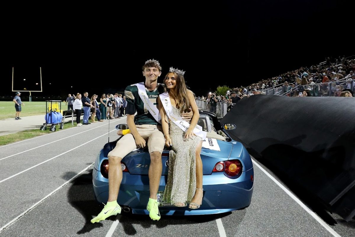 THIS YEAR'S HOMECOMING King and Queen are seniors LOLITA LOLAJ AND Brycen Widhelm. The two were chosen as student favorites, which was evident when the crowd went wild.