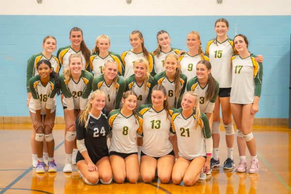 Cox girls volleyball strikes a pose for the camera