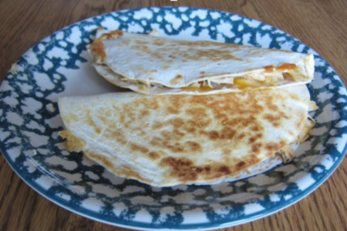 CHICKEN AND CHEESE quesadillas lay hot and ready to eat. The quesadillas were the first dish prepared by the chefs. 