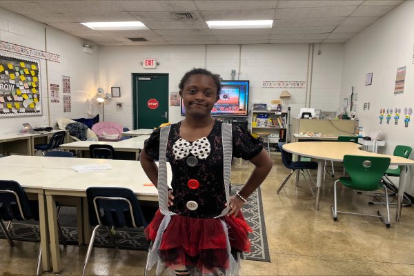 COFFEE SHOP WORKER DeeDee Fulton receives the "Employee of the Month" award. Fulton was chosen  because of her dedication and the effort she puts into the job.
