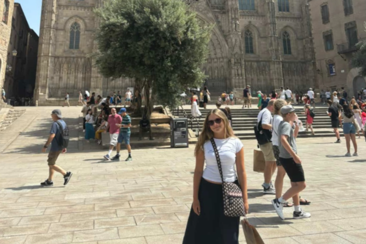 JUNIOR HADLEY FUGATE strolls through the beautiful streets of Barcelona, Spain, shopping bags in hand. She has loved being able to explore the city and its culture.