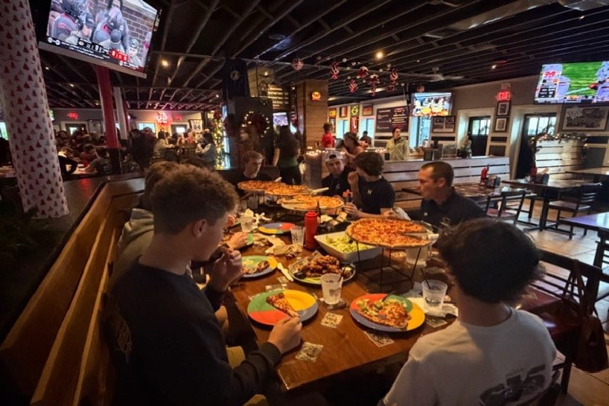 HEAD BASEBALL COACH Matt Ittner treated 11 of his JV and varsity players to lunch at Shorebreak Pizza. The mixed group included JV and Varsity players.