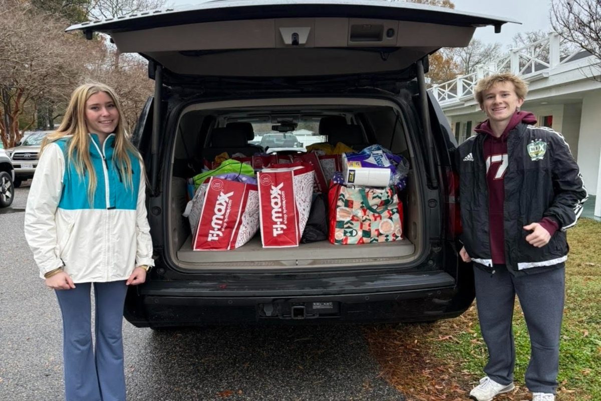 JOURNALISM STUDENT HUNTER Tromly gives back to the community by participating in Operation Smile's holiday food drive.  The community was definitely feeling the support, which is a blessing at this time of year.