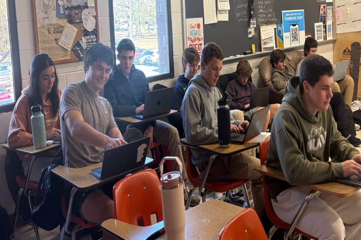STUDENTS WORK DILIGENTLY on Chromebooks to finish out their coursework by the end of the week. The end of the semester is marked by students hustling to complete last minute  tasks.