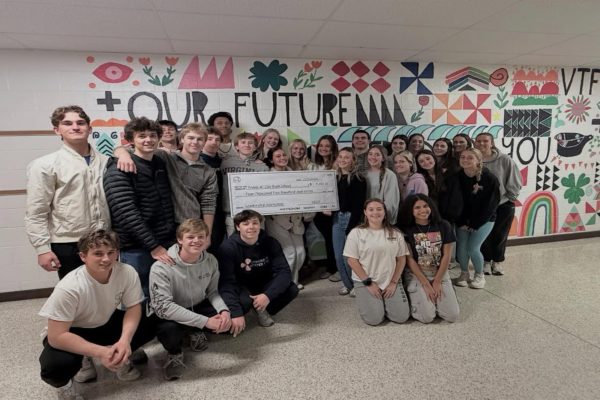 LONG-TIME TEACHER Nancy Fowlkes presented the Leadership Workshop staff with a large check , a grant, for the upcoming annual workshop. Leadership Workshop is an annual weekend long event held on Eastern Shore.